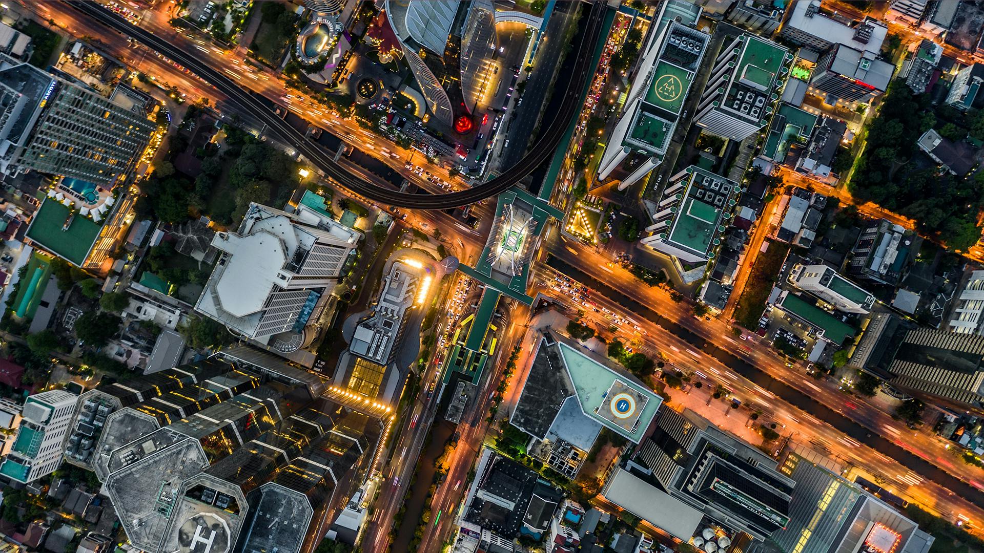 top down photo of a busy intersection in a highly developed city