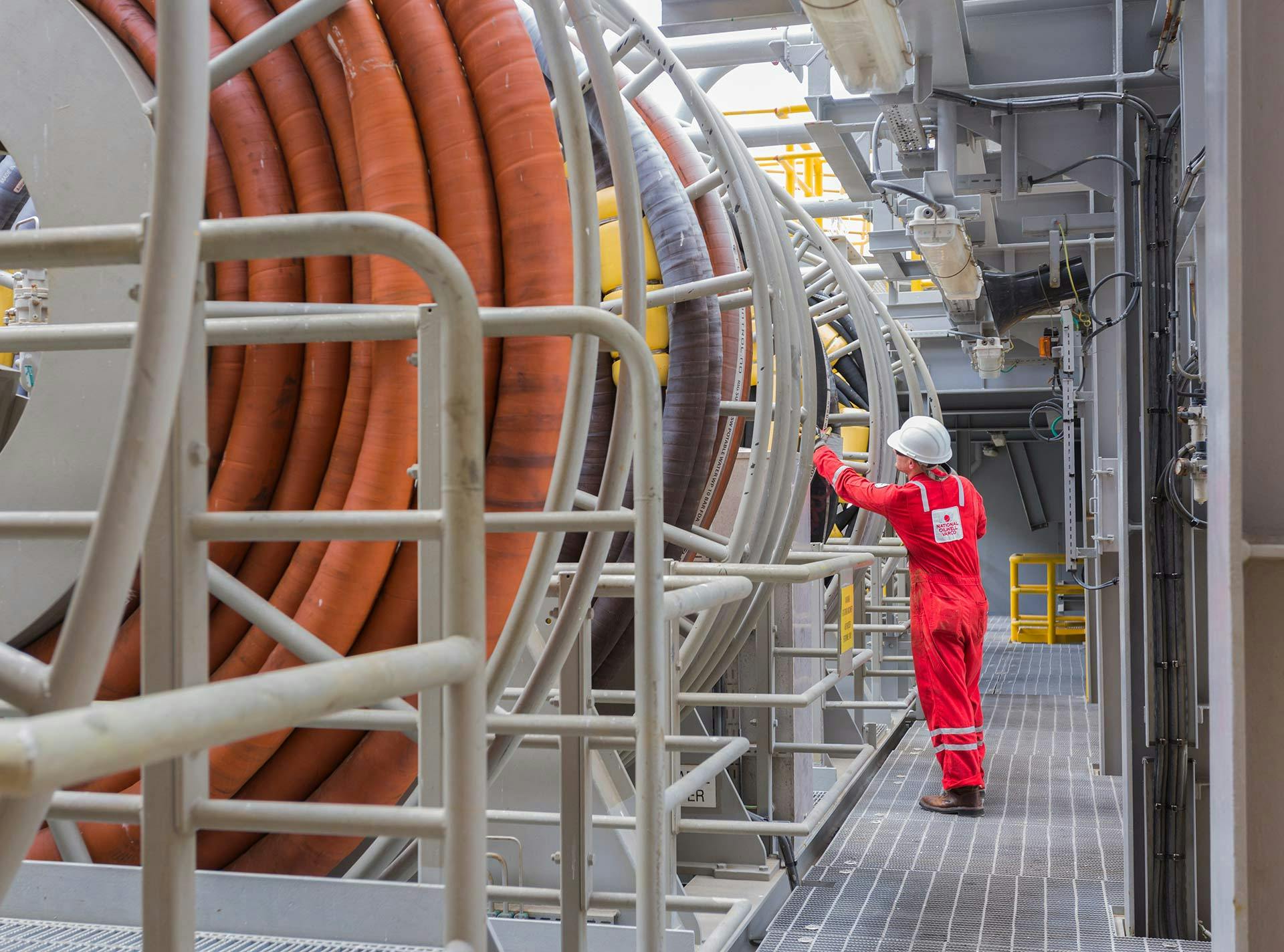 Hose loading station and hose reels as seen on a drilling rig