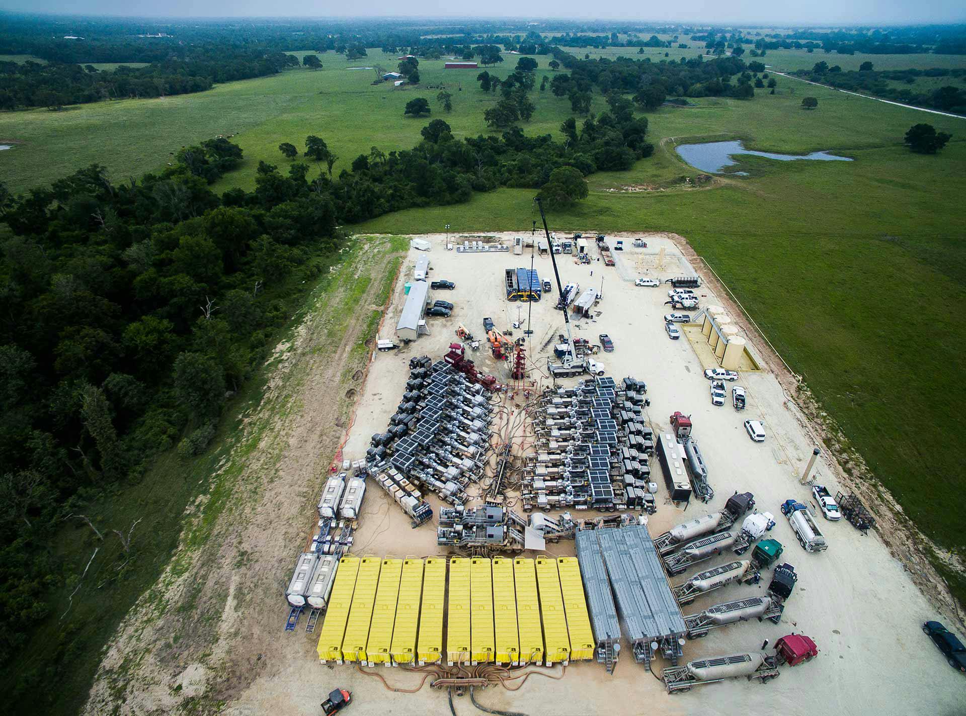 An aerial view of a Rolligon frac spread