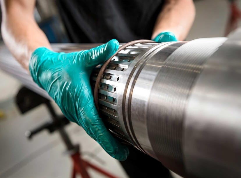 A technician handles an i-Trace tool used for well control